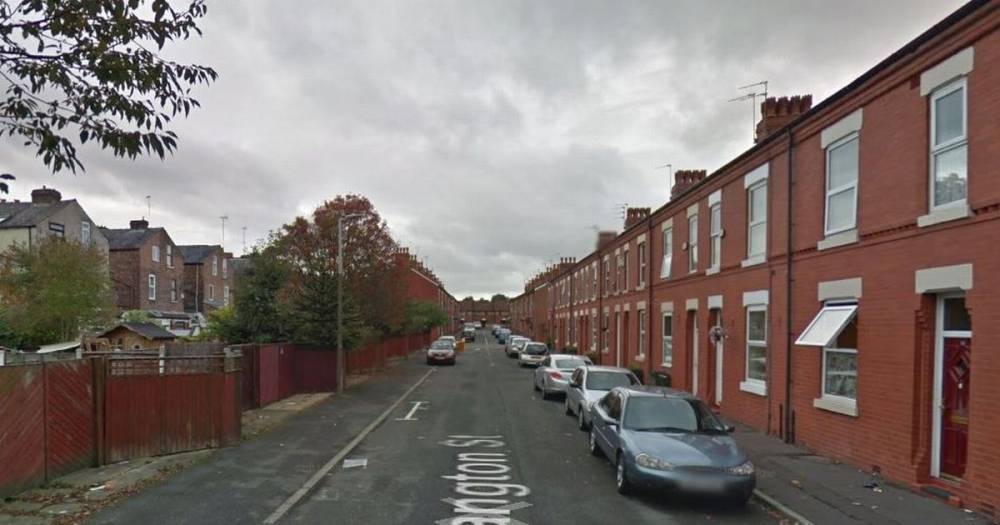 Wanted man suffers life-changing injuries after falling from roof while trying to escape police - www.manchestereveningnews.co.uk