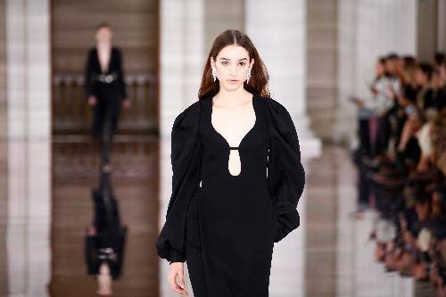 Victoria Beckham's black dresses, chunky platform boots stage 'gentle rebellion' at London Fashion Week - flipboard.com