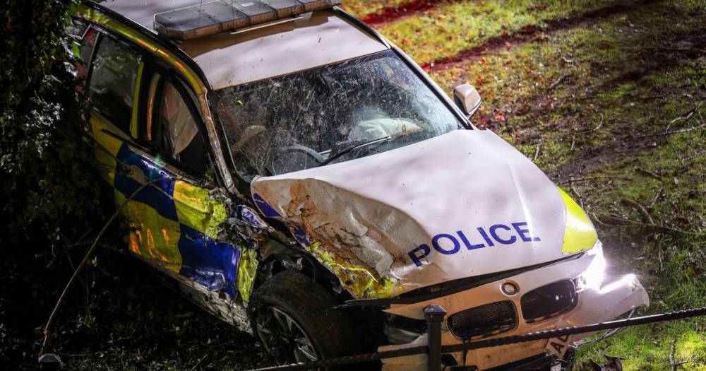 Man arrested after rookie cop dragged himself from smashed police car to chase suspect is released - www.manchestereveningnews.co.uk - county Pendleton