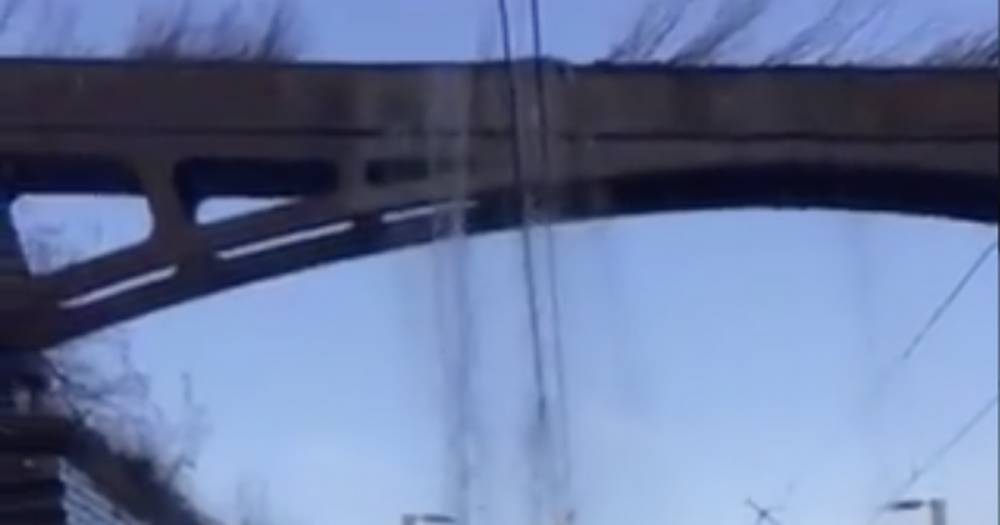 Dramatic footage of water pouring onto overhead rail wires near Glasgow amid Storm Dennis - www.dailyrecord.co.uk