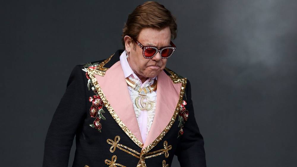 Elton John tearfully escorted off stage after losing his voice mid-concert - flipboard.com - New Zealand