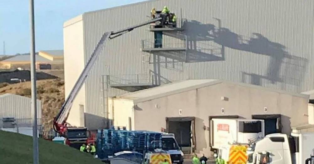 Fire crews rescue man from roof of Aberdeenshire fish factory - www.dailyrecord.co.uk