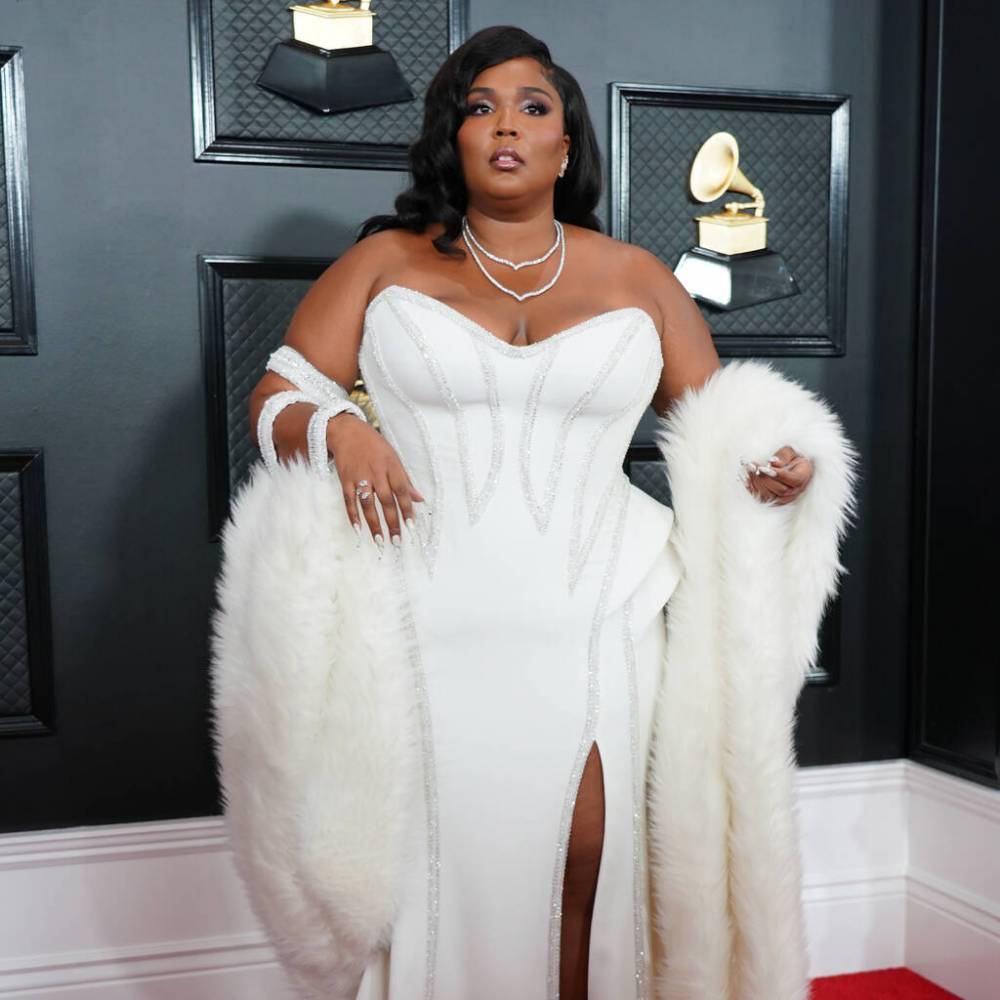 Lizzo proves adoration for Harry Styles with cover performance - www.peoplemagazine.co.za - Britain