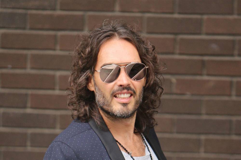 Russell Brand calls for change to ‘public values’ after Caroline Flack’s death - www.hollywood.com - Britain