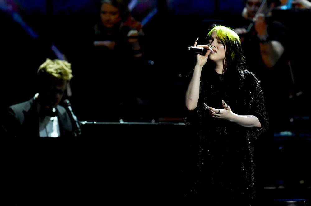Billie Eilish Flourishes With Debut Performance of Bond Song 'No Time to Die' at 2020 Brit Awards - www.billboard.com