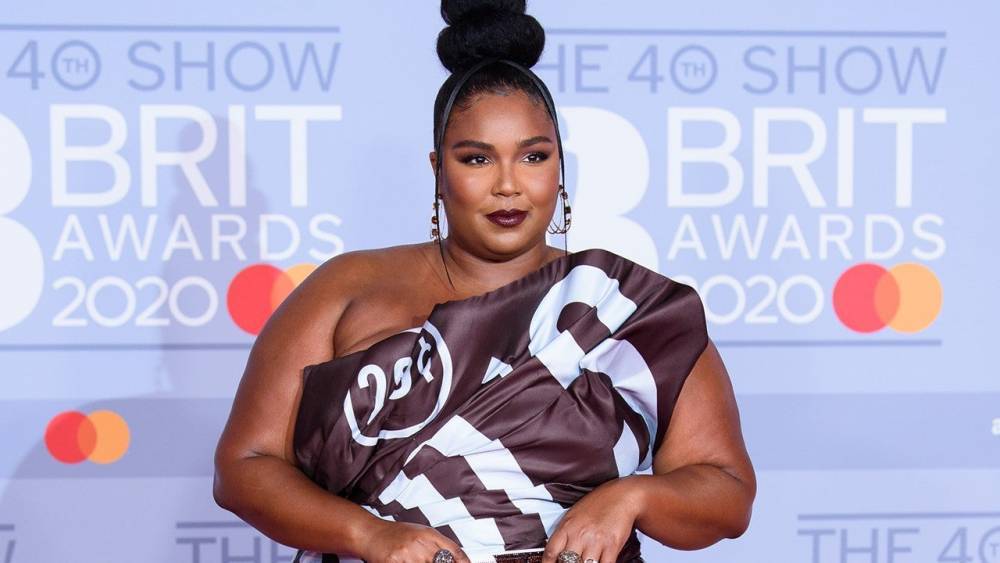 Lizzo Is a Snack in Stunning Chocolate Bar Dress at 2020 Brit Awards - www.etonline.com - London
