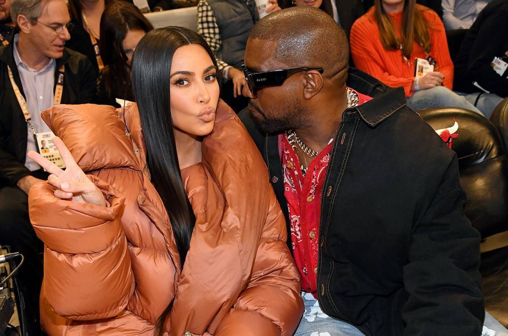 Kim Kardashian and Kanye West's Awkward Kiss-Cam Moment Has Fans Flipping: See the Best Reactions - www.billboard.com - Chicago