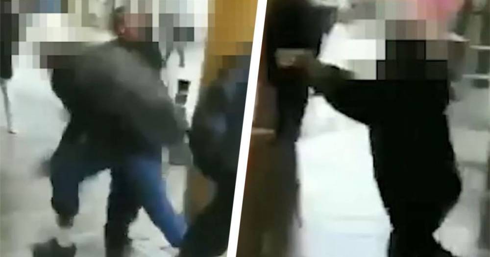 This video shows a policeman threatening to fire a taser in a shopping centre - now the incident is under investigation - www.manchestereveningnews.co.uk - county Oldham