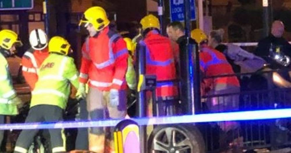 Four men in hospital as police pursuit ends in horrific car crash at Metrolink tram stop - www.manchestereveningnews.co.uk - Manchester