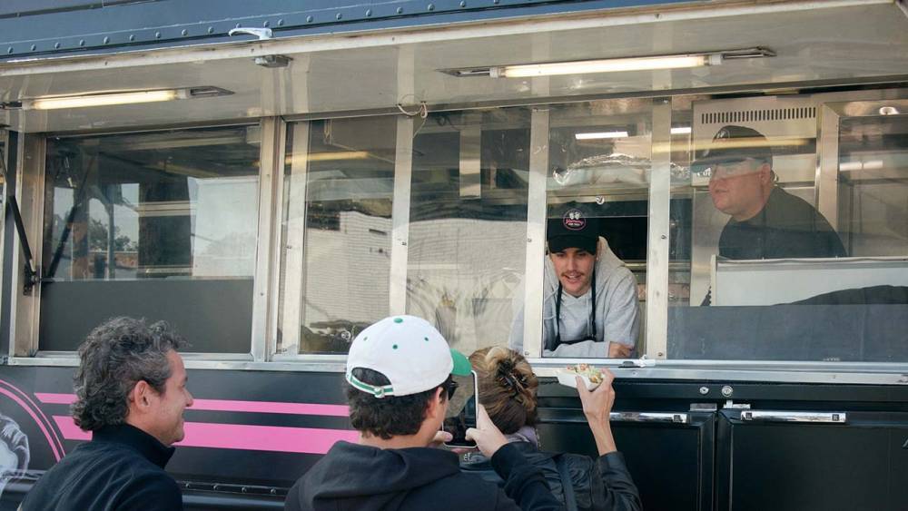 Justin Bieber and James Corden Open "Yummy"-Inspired Food Truck - www.hollywoodreporter.com