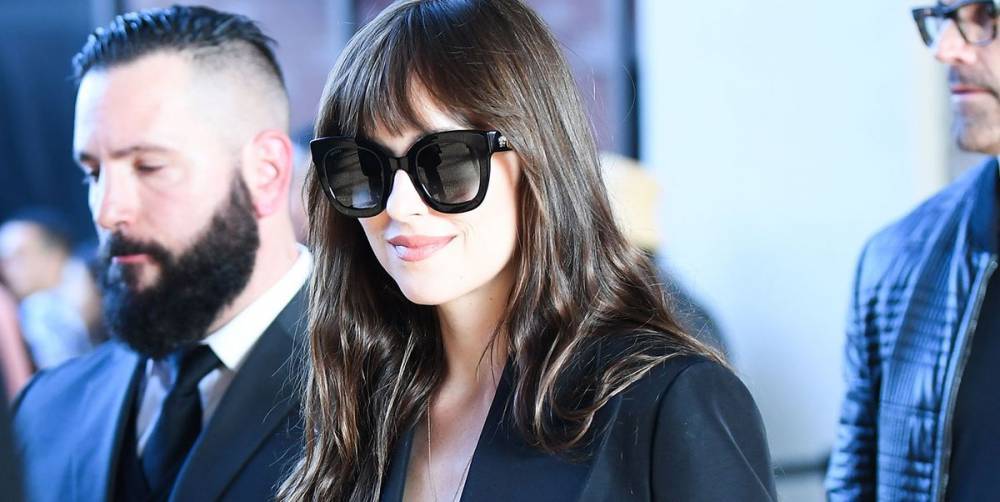 Dakota Johnson Pairs Lingerie With a Gucci Suit for Chic Milan Fashion Week Look - www.elle.com - London - New York