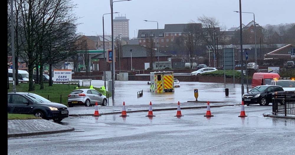 Ambulance stranded in flood water in Paisley as heavy rain and wind causes travel chaos - www.dailyrecord.co.uk - Scotland