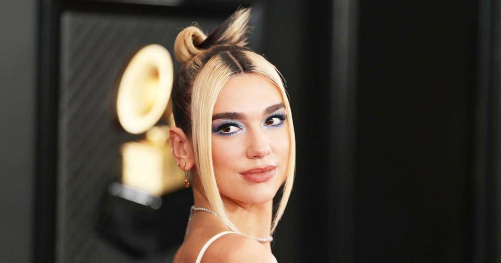 Dua Lipa Says Her New Side-Swept Bangs Were an Accident: ‘PSA: This Is Not a Haircut’ - www.usmagazine.com