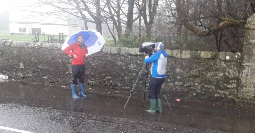 Weather Update: TV weatherman Sean Batty dons his wellies to film sinking car in Lochwinnoch - www.dailyrecord.co.uk