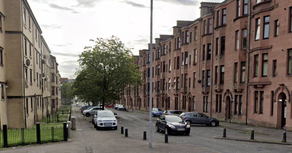 Woman rushed to hospital with serious injuries after fire inside Glasgow flats - www.dailyrecord.co.uk - Scotland