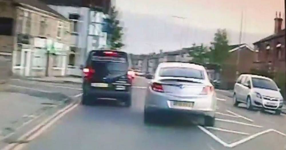 Thief in stolen car drags owner down the street as they desperately try to cling on...he went onto ram a police car in 90mph chase - www.manchestereveningnews.co.uk - London