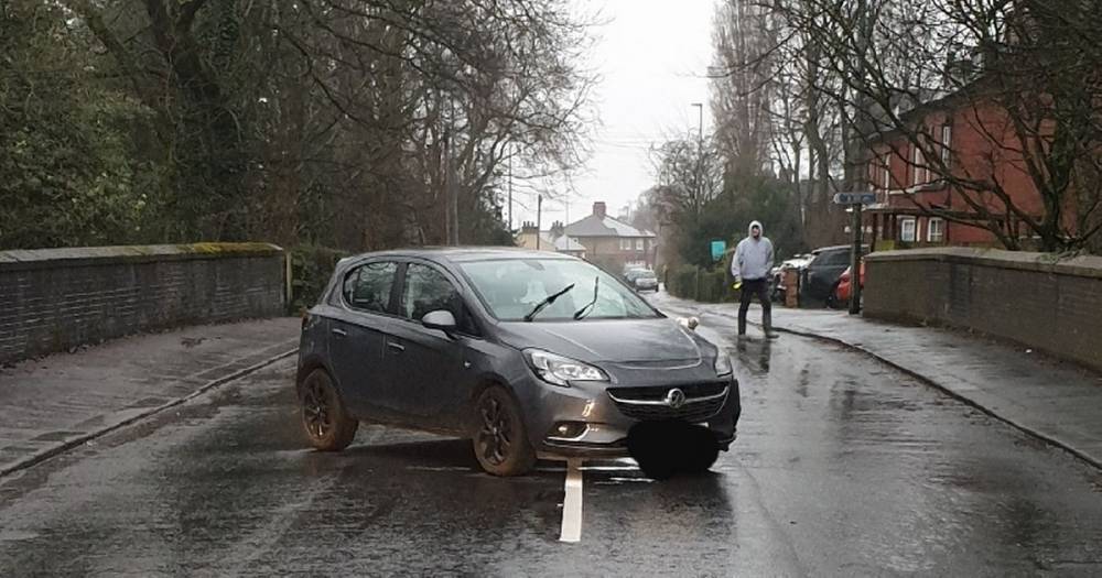 Police left scratching their heads after cars found parked and secure in the middle of the road - www.manchestereveningnews.co.uk