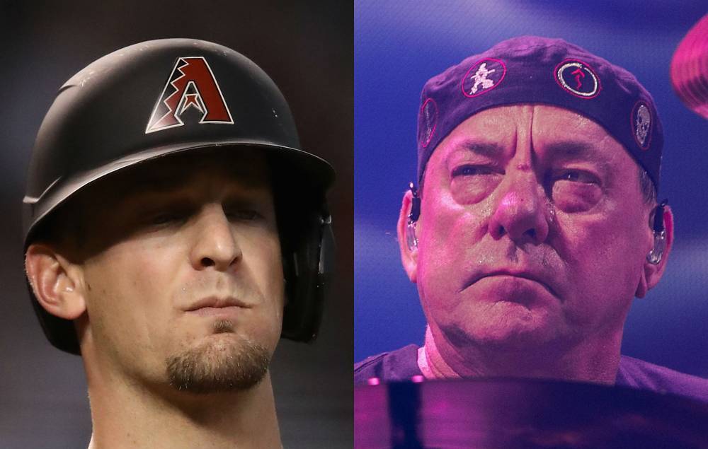 Toronto Blue Jays catcher pays air-drumming tribute to Neil Peart - www.nme.com