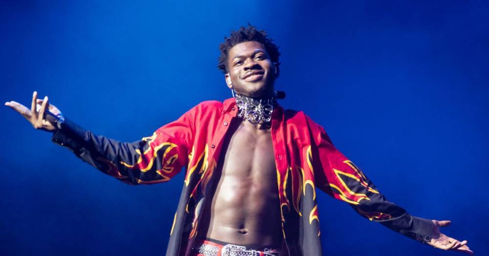 Watch Lil Nas X Make a Grand Entrance with a Bride When He Crashes a Wedding at Disney World - flipboard.com