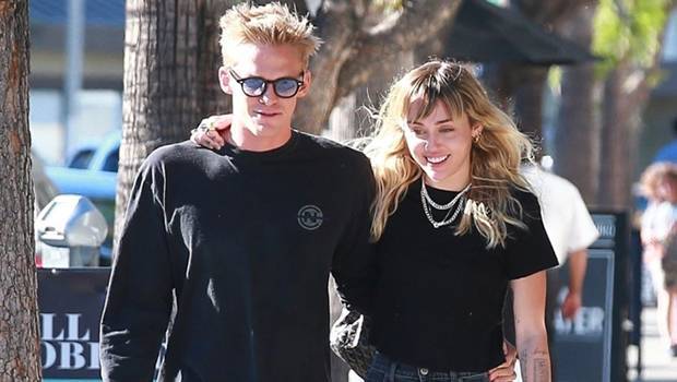 Miley Cyrus Cozies Up To Cody Simpson As They Rock Matching Sunglasses In New Photo - hollywoodlife.com - Illinois - county Rock
