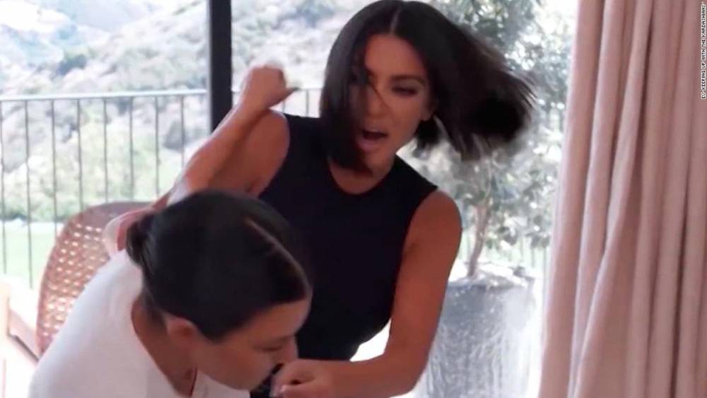 Kim Kardashian West appears to throw a punch at her sister, Kourtney Kardashian - flipboard.com