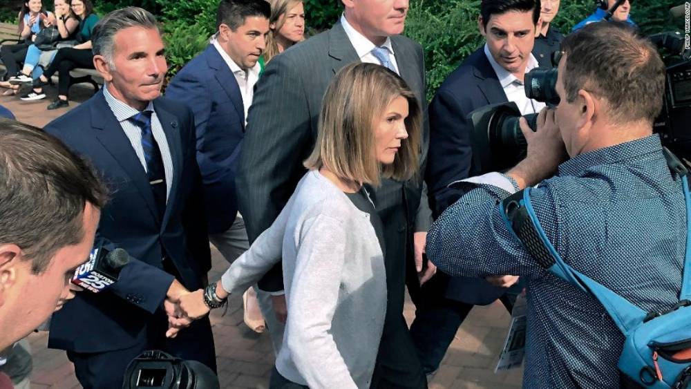 Lori Loughlin and Mossimo Giannulli's legal team files a motion to postpone setting a trial date over newly released evidence - flipboard.com