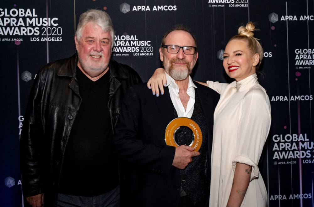 Sia Presents Award to Fellow Aussie Colin Hay, Her 'Uncle Collie,' At Inaugural Global APRA Music Awards - www.billboard.com - Australia - Scotland - Los Angeles