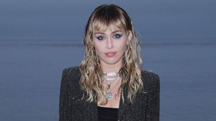 Well, Now We Know Miley Cyrus Flashes Her Boobs for Cody Simpson as He Works on New Music - stylecaster.com
