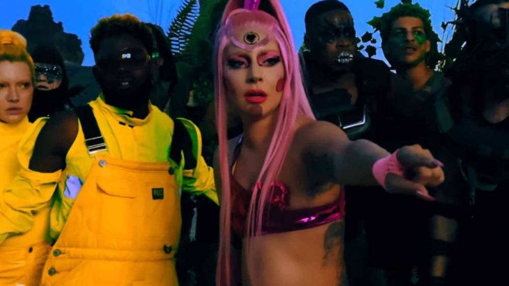 Lady Gaga's 'Stupid Love' Music Video Is Set in a Universe All Her Own - www.etonline.com