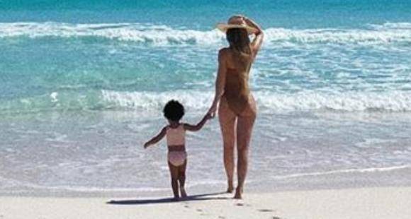 PHOTO: Kylie Jenner sports a chic swimsuit as she takes a stroll by the shore with Stormi - www.pinkvilla.com