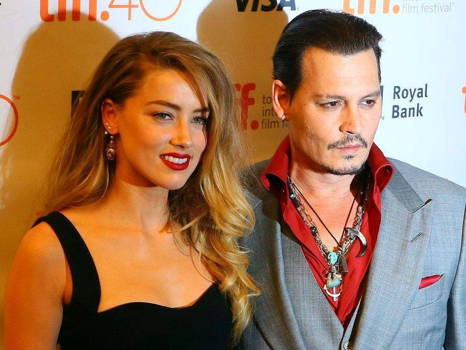 Amber Heard admits to hitting ex Johnny Depp in leaked audio recording - torontosun.com - Britain - Washington