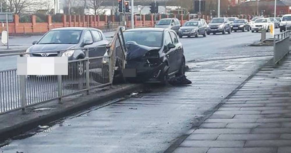 Man taken to hospital after car smashes into railings in Oldham - www.manchestereveningnews.co.uk - Manchester - county Oldham