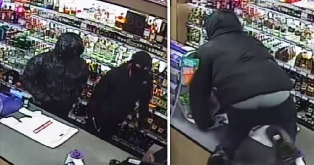 CCTV shows the moment masked robbers - one carrying a huge hunting knife - raided shop for booze and cash - www.manchestereveningnews.co.uk