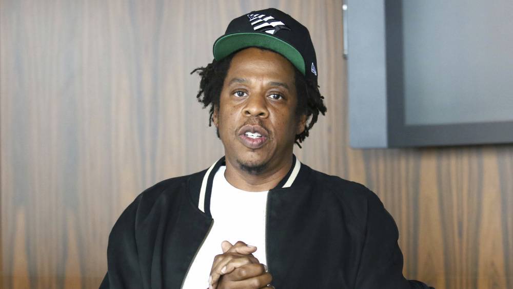 Jay-Z explains why he was seated during Super Bowl LIV national anthem - www.foxnews.com