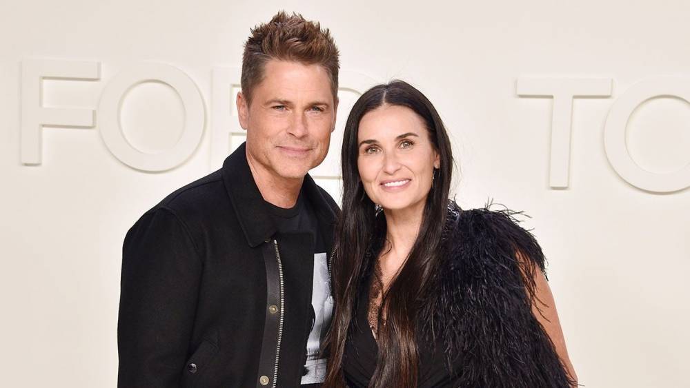 Demi Moore and Rob Lowe Share a Kiss at Fashion Show - www.etonline.com - California