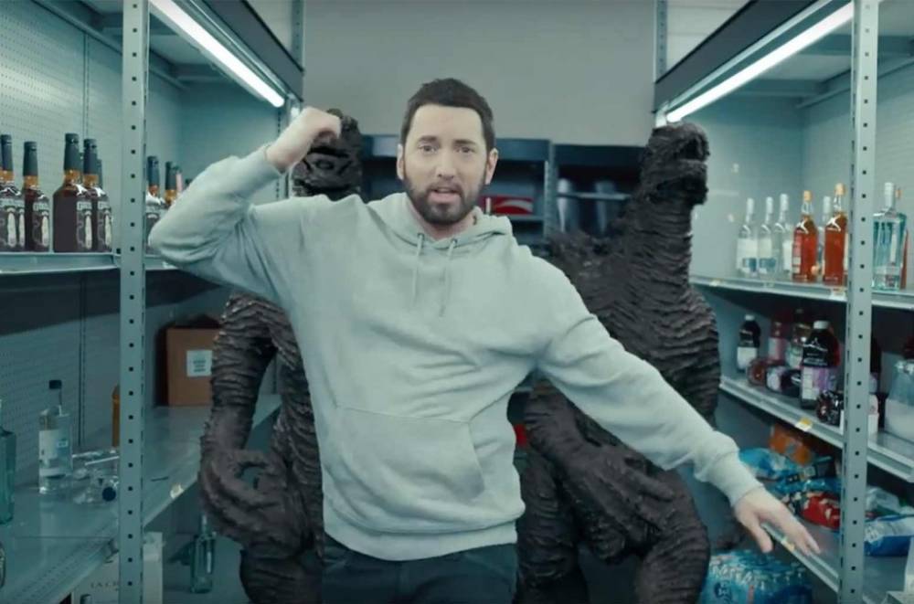 Eminem Enlists Dr. Dre & Mike Tyson, Pays Tribute to Juice WRLD in Trippy 'Godzilla' Video - www.billboard.com
