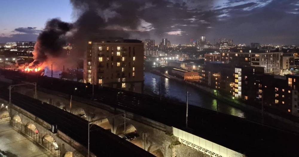 Huge plumes of smoke visible for miles over Manchester city centre after fire at scrap yard - www.manchestereveningnews.co.uk - Manchester