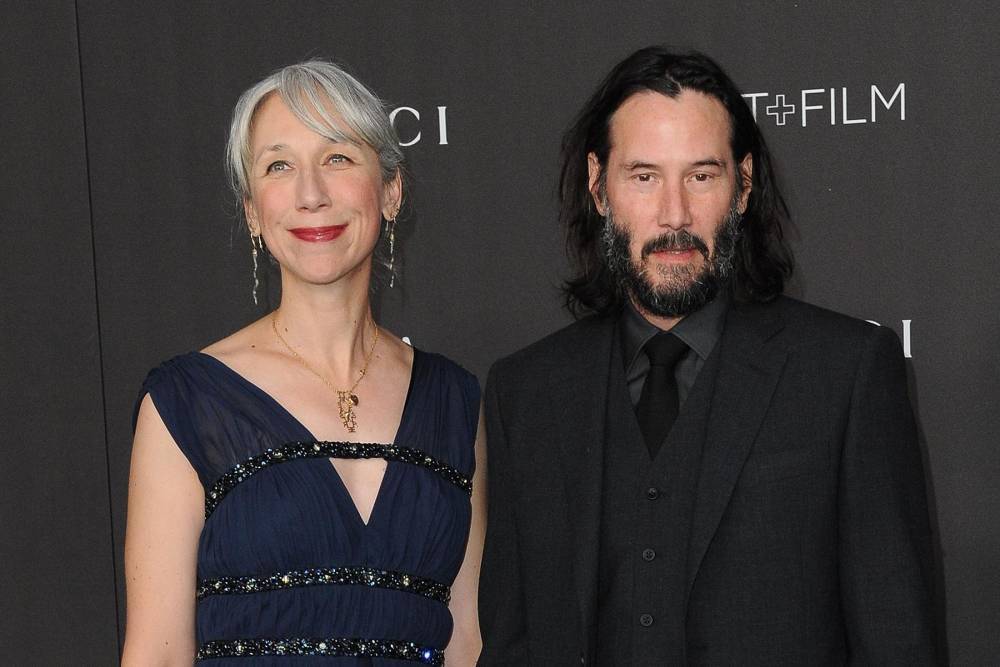 Keanu Reeves’ girlfriend inundated with calls from pals after red carpet appearance - www.hollywood.com - Britain
