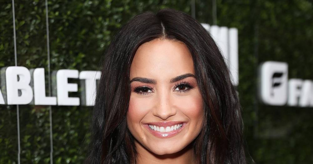 A Comprehensive Guide to Demi Lovato’s Extensive and Meaningful Tattoo Collection - www.usmagazine.com
