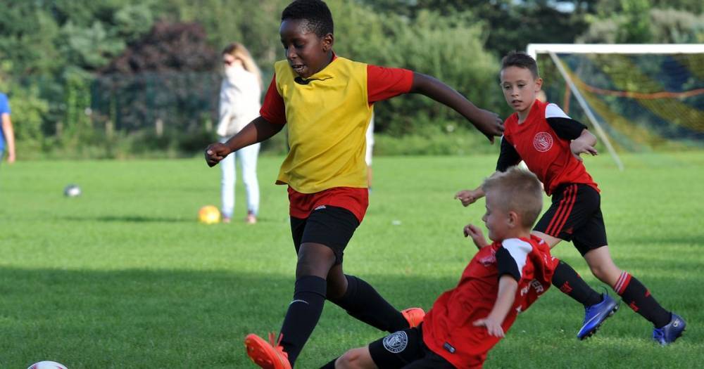 Kids football in Salford to go ahead despite coronavirus concerns - www.manchestereveningnews.co.uk - Britain