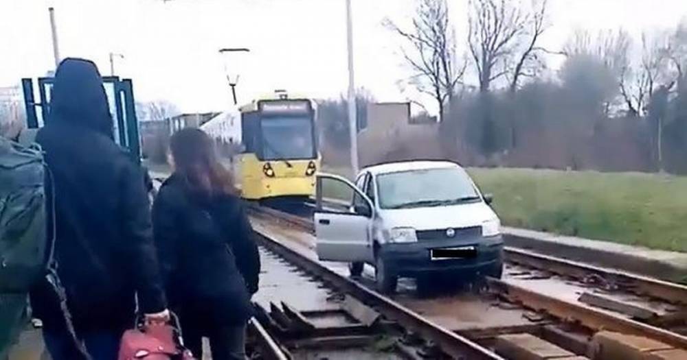 Manchester Airport Metrolink line 'part suspended' due to car on tracks - www.manchestereveningnews.co.uk - Manchester