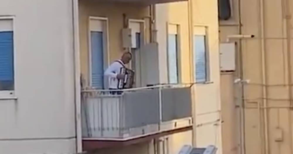 Watch as locked down Italians sing songs of solidarity on balconies amid coronavirus chaos - www.dailyrecord.co.uk - Italy