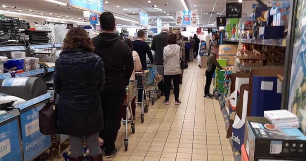 'It's absolutely crazy what people are doing'... coronavirus panic buying leads to empty supermarket shelves - www.manchestereveningnews.co.uk