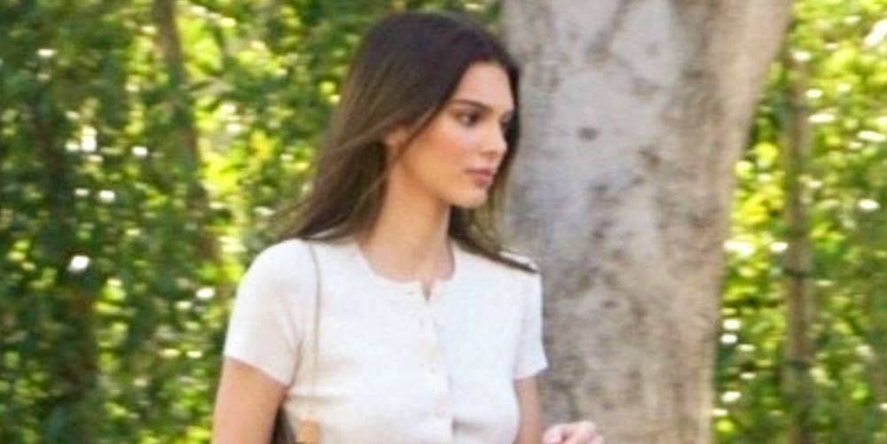 Kendall Jenner Wore an Itty Bitty Crop Top With White Jeans to Lunch Out - www.elle.com