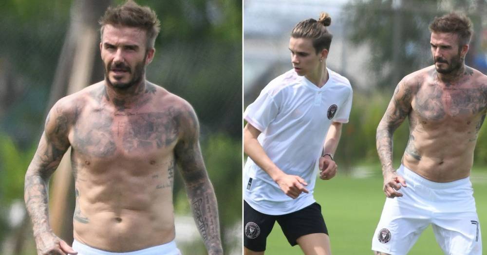 David Beckham shows off toned body during shirtless football match with his sons after Victoria boasts about his 'huge' manhood - www.ok.co.uk - Miami - Florida