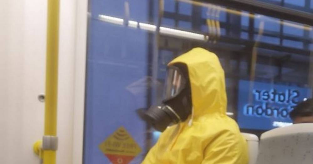 A man has been catching the tram in a full hazmat suit and mask - www.manchestereveningnews.co.uk - Manchester