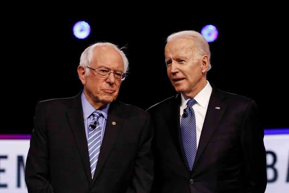 With An Elbow Bump, Joe Biden And Bernie Sanders Start “Unusual” Debate Dominated By The Politics Of A Pandemic - deadline.com