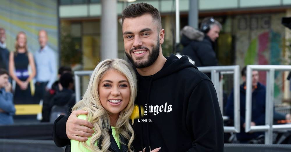 Love Island winners Paige Turley and Finn Tapp put on loved-up display while playing football - www.ok.co.uk - Manchester - city Media