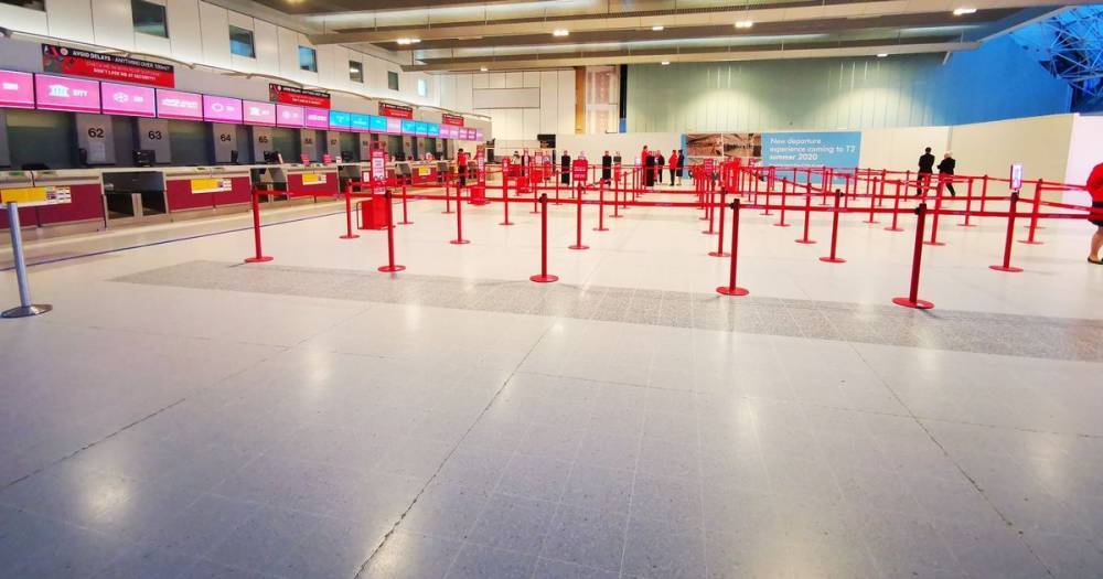 Manchester Airport eerily quiet as coronavirus pandemic sees scores of flights cancelled - www.manchestereveningnews.co.uk - Britain - Manchester