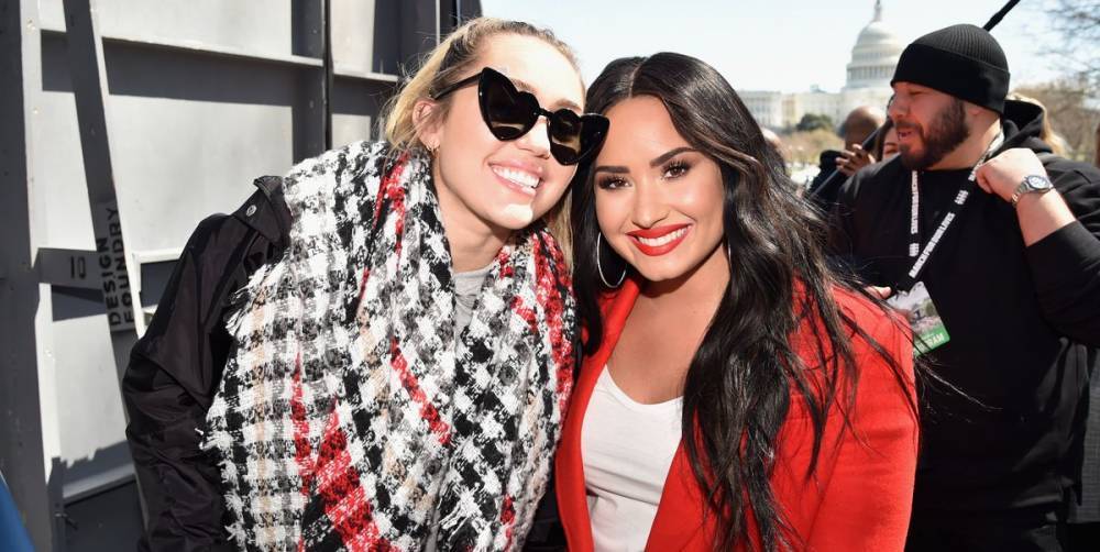 Miley Cyrus Told Demi Lovato She Struggled With Body Image for Years After VMAs Performance - www.harpersbazaar.com